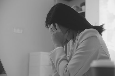 Tired teen girl rubbing dry irritable eyes feel eye strain tension migraine after computer work,...