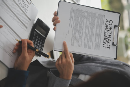 Business Signing a Contract Buy - sell house, insurance agent analyzing about home investment loan...