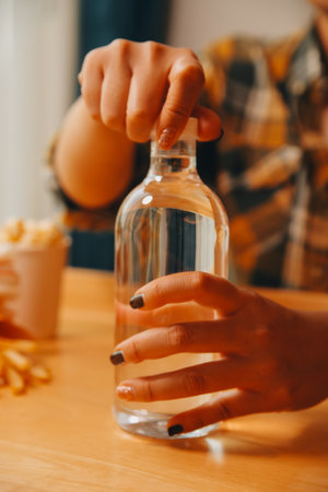 healthy beautiful young woman holding glass of waterの写真素材