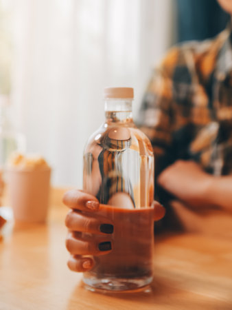 healthy beautiful young woman holding glass of waterの写真素材