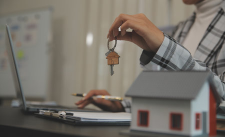 buy or sell real estate mortgage, Sale representative offer house purchase contract to buy a house or apartment and mortgage Money and Financial Conceptsの写真素材