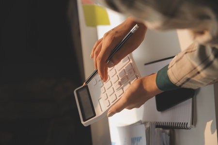 Team of business people working together in the meeting room office, teamwork background charts and graphs banner, double exposure successful teamwork,business planning concept.の写真素材