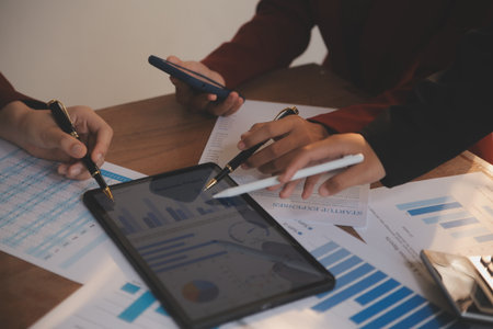 Business people are analyzing and planning business strategies.