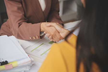 Teamwork executives colleagues business people handshake after meetingの写真素材