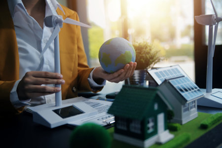 Carbon offset price report CO2 emission. Future growth Net zero waste in ESG ethical SME office protect climate change global warming social issues project. Group of asia people Eco friendly SDGs planの写真素材