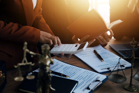 Mediation client meeting lawyer consulting government help, Businessman and Male lawyer or judge consult having team meeting with client, Law and Legal services concept.の写真素材