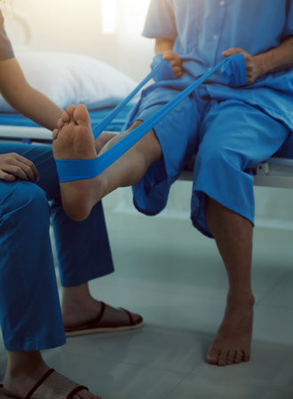 Physical therapists work with patients in close-up clinics. The concept of rehabilitation of...