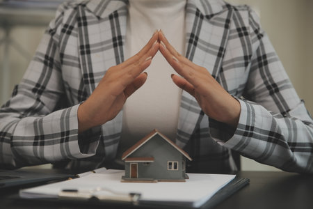 buy or sell real estate mortgage, Sale representative offer house purchase contract to buy a house or apartment and mortgage Money and Financial Conceptsの写真素材