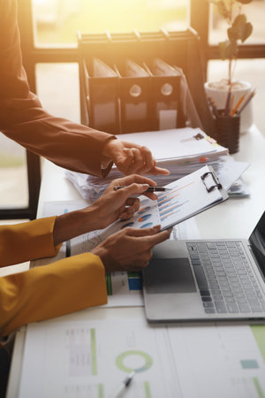 Team of business people working together in the meeting room office, teamwork background charts and graphs banner, double exposure successful teamwork,business planning concept.の写真素材