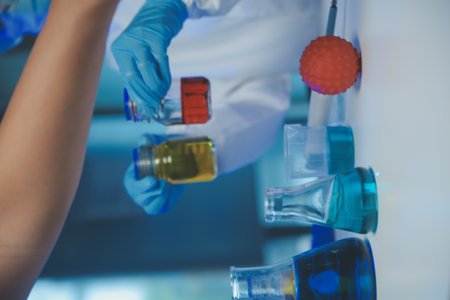 professional chemist woman laboratory using scientific microscope for science research, chemistry scientist with microbiology medicals equipment technology to working with medicine biology experimentの写真素材