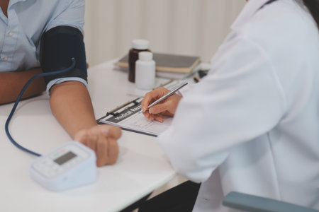 The doctor woman hand use the pulse meter to measure the pressure of the patient, medical checkup...