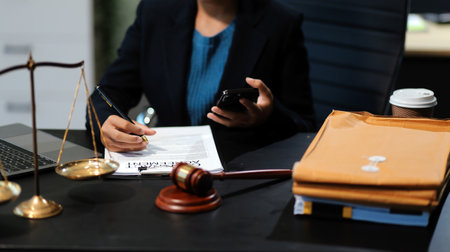 female business woman lawyers working at the law firms. Judge gavel with scales of justice. Legal...