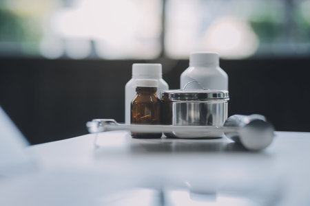 Health care billing statement with stethoscope, bottle of medicine for doctor's work in medical...