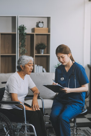Elderly health checkups with a physician or psychiatrist who works with patients who are consulted about female or psychiatric diagnosis in a medical clinic or hospital mental health service.の写真素材
