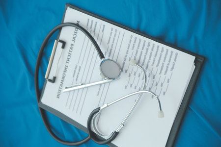 In a hospital setting, the presence of a doctor's physician book and stethoscope carries with it an...
