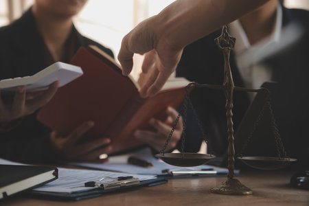 Mediation client meeting lawyer consulting government help, Businessman and Male lawyer or judge consult having team meeting with client, Law and Legal services concept.の写真素材