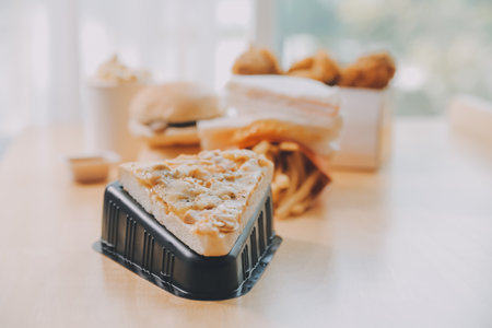 Multiple type of Fast food on table.