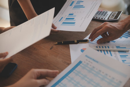 Business meetings to analyze investment strategies and brainstorm sales plans for a more profitable business.の写真素材