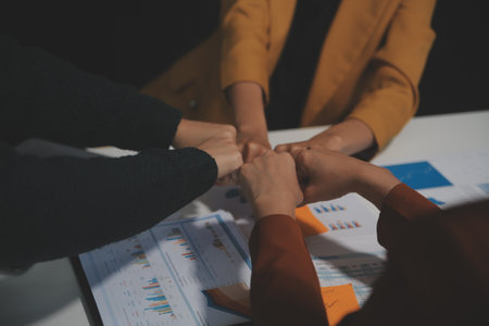 Hand join together for work togetherness, Hand stack for business and service, Team volunteering or teamwork. Concept connection of community and charity. Group of business workforce participation.の写真素材