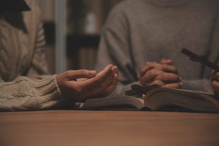 Christian group are praying to god with the bible and sharing the gospel. Concept of faith for god.の写真素材
