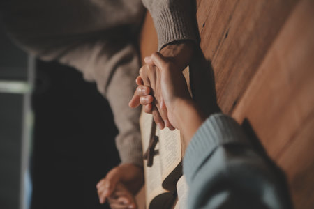 Christian group are praying to god with the bible and sharing the gospel. Concept of faith for god.の写真素材