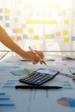 businessman working data document graph chart report marketing research development planning management strategy analysis financial accounting. Business office concept.の写真素材