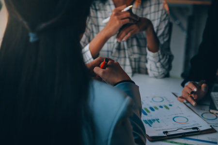 Fund managers team consultation and discuss about analysis Investment stock market at officeの写真素材