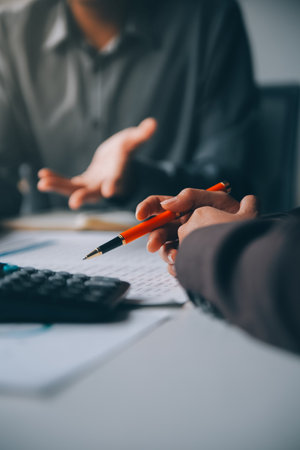 Accountant or banker making calculations Bookkeeper Clerk, Bank Advisor And Auditor. Accounting concept.の写真素材