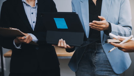 Fund managers team consultation and discuss about analysis Investment stock market at officeの写真素材