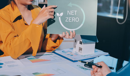 ESG environmental social governance display on laptop on eco-friendly company meeting with business people implementing environmental protection for clean and sustainable future ecology. Trailblazingの写真素材