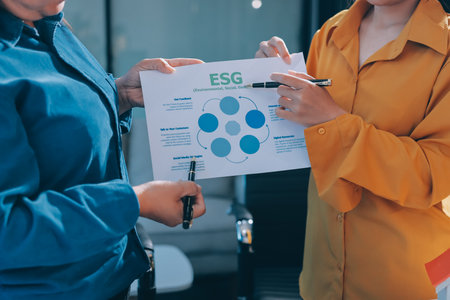 ESG environmental social governance display on laptop on eco-friendly company meeting with business people implementing environmental protection for clean and sustainable future ecology. Trailblazingの写真素材