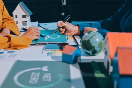 ESG environmental social governance display on laptop on eco-friendly company meeting with business people implementing environmental protection for clean and sustainable future ecology. Trailblazingの写真素材