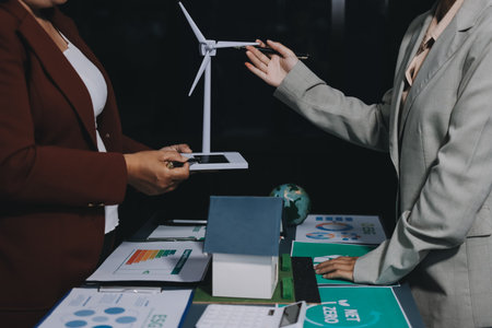 Carbon offset price report CO2 emission. Future growth Net zero waste in ESG ethical SME office protect climate change global warming social issues project. Group of asia people Eco friendly SDGs planの写真素材