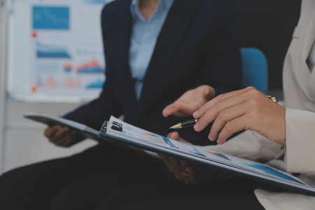 Business Documents, Auditor businesswoman checking searching document legal prepare paperwork or report for analysis TAX time,accountant Documents data contract partner deal in workplace officeの写真素材