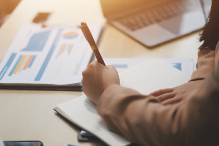 business documents businessman check legal document review Prepare documents or analysis reports, tax items, accounting documents, data contracts, office partner agreements.の写真素材