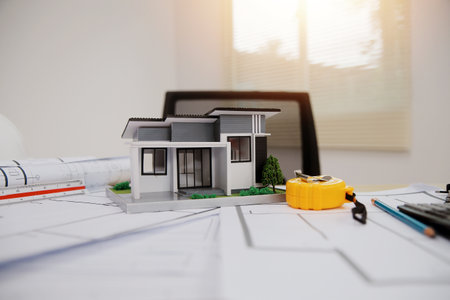 Architects, engineers, contractors working in the office with blueprints, inspection engineers Work...
