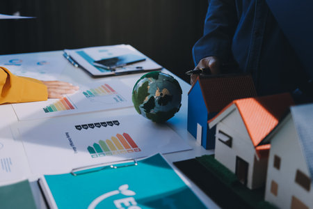 ESG environmental social governance display on laptop on eco-friendly company meeting with business people implementing environmental protection for clean and sustainable future ecology. Trailblazingの写真素材