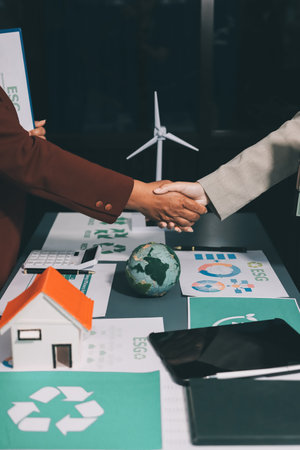Carbon offset price report CO2 emission. Future growth Net zero waste in ESG ethical SME office protect climate change global warming social issues project. Group of asia people Eco friendly SDGs planの写真素材