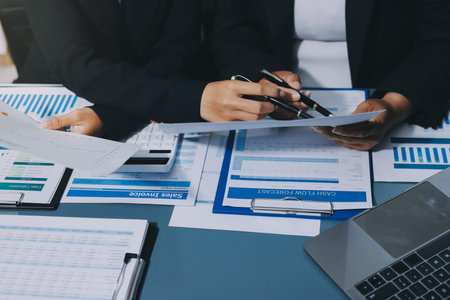 Fund managers team consultation and discuss about analysis Investment stock market at officeの写真素材