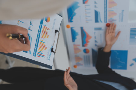 Business Documents, Auditor businesswoman checking searching document legal prepare paperwork or report for analysis TAX time,accountant Documents data contract partner deal in workplace officeの写真素材