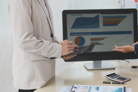 Business Documents, Auditor businesswoman checking searching document legal prepare paperwork or report for analysis TAX time,accountant Documents data contract partner deal in workplace officeの写真素材