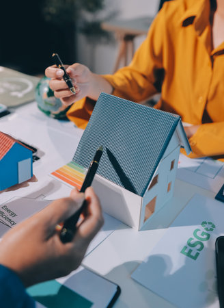 ESG environmental social governance display on laptop on eco-friendly company meeting with business people implementing environmental protection for clean and sustainable future ecology. Trailblazingの写真素材