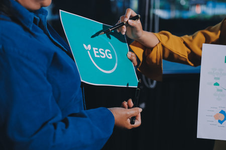 ESG environmental social governance display on laptop on eco-friendly company meeting with business people implementing environmental protection for clean and sustainable future ecology. Trailblazingの写真素材