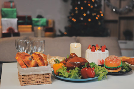 Happy multigeneration family enjoying in opening gifts on Christmas eve at home.の写真素材