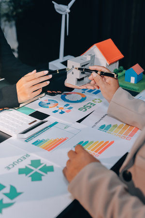 Carbon offset price report CO2 emission. Future growth Net zero waste in ESG ethical SME office protect climate change global warming social issues project. Group of asia people Eco friendly SDGs planの写真素材