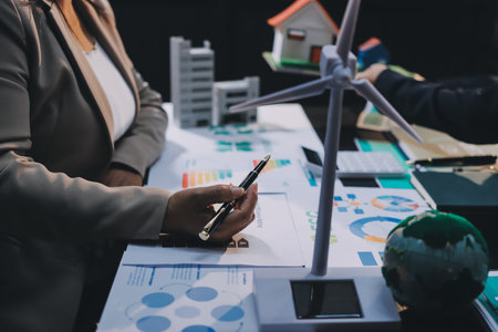 Carbon offset price report CO2 emission. Future growth Net zero waste in ESG ethical SME office protect climate change global warming social issues project. Group of asia people Eco friendly SDGs planの写真素材