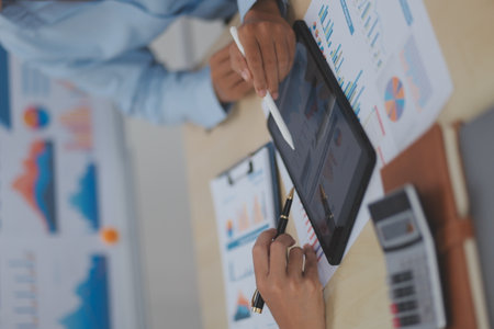 Business Documents, Auditor businesswoman checking searching document legal prepare paperwork or report for analysis TAX time,accountant Documents data contract partner deal in workplace officeの写真素材