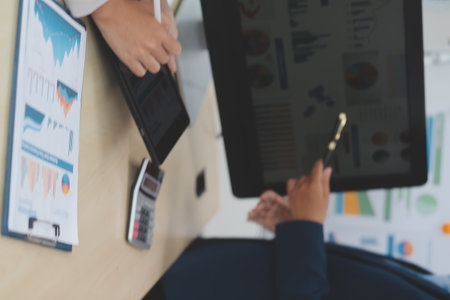 Business Documents, Auditor businesswoman checking searching document legal prepare paperwork or report for analysis TAX time,accountant Documents data contract partner deal in workplace officeの写真素材