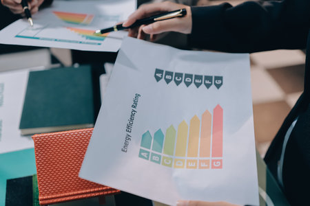 Carbon offset price report CO2 emission. Future growth Net zero waste in ESG ethical SME office protect climate change global warming social issues project. Group of asia people Eco friendly SDGs planの写真素材