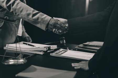 Judge gavel with Justice lawyers having team meeting at law firm background. Concepts of Law and Legal services.の写真素材